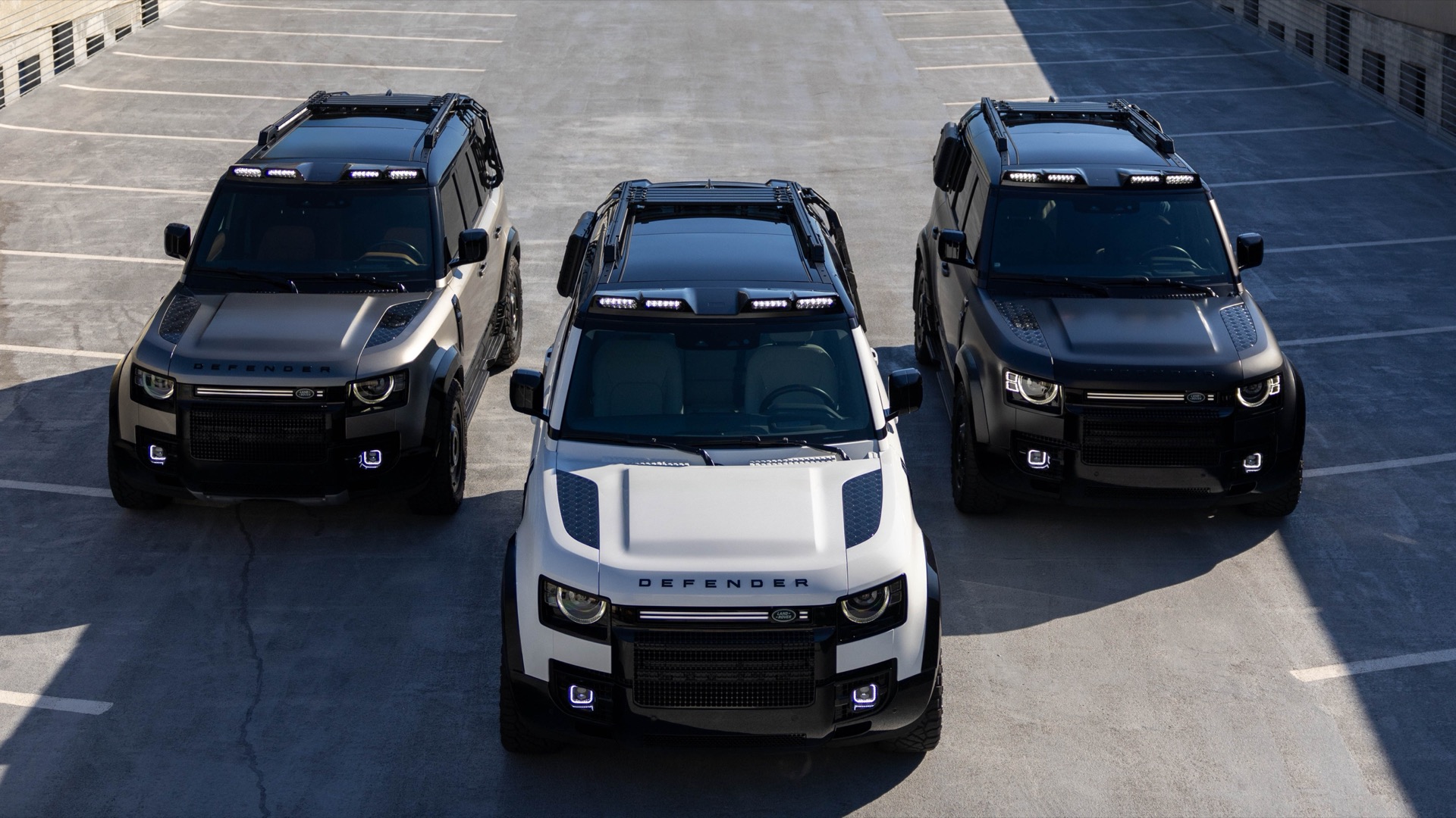 Three Artemis Defender builds on a rooftop deck overlooking the Atlanta skyline